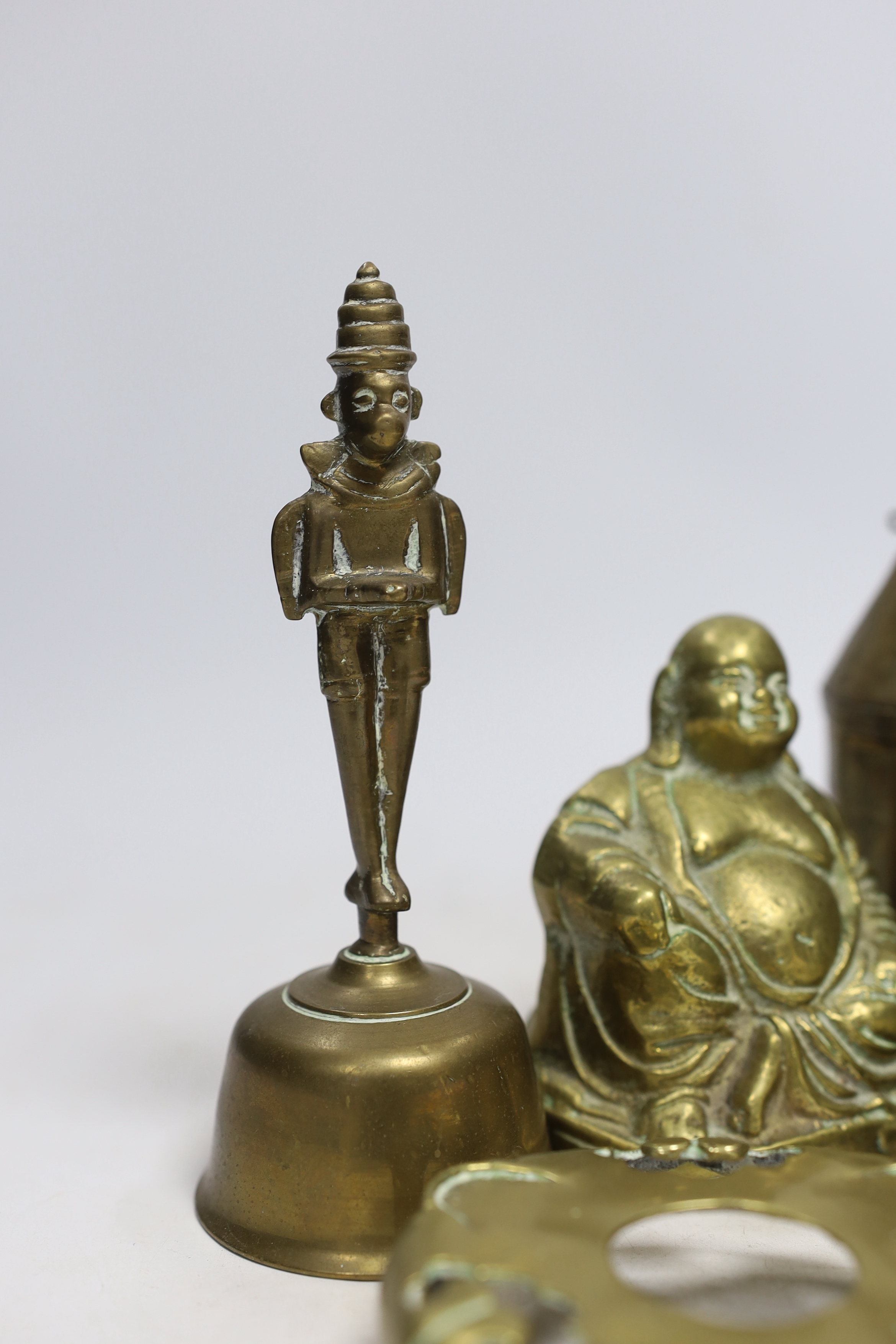 Sundry metalware including hinged brass frog with compartment, nutcrackers, a seated Buddha and a 925 gilt enamel spoon